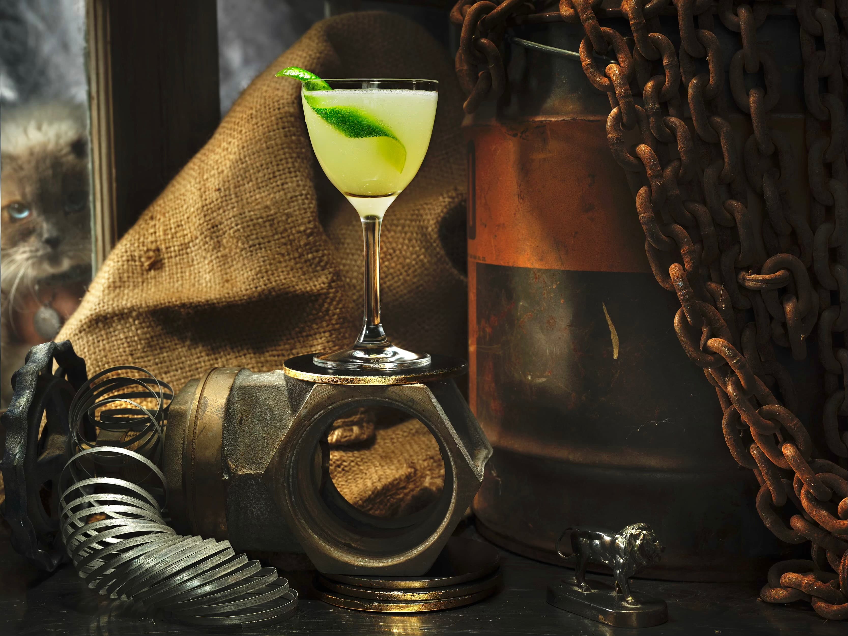 Pale green coupe styled with burlap, chains, and industrial objects